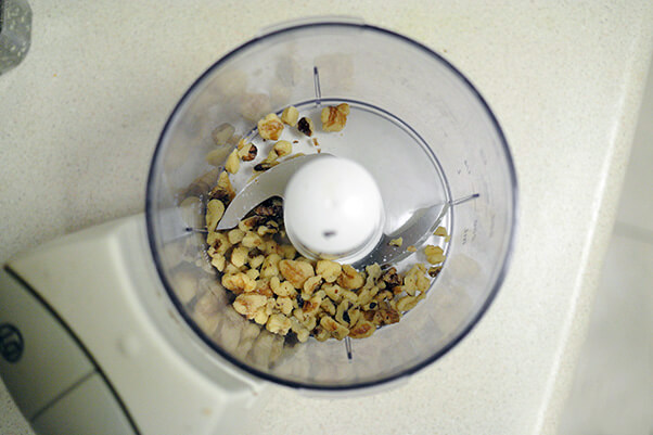 01Add walnuts to processor