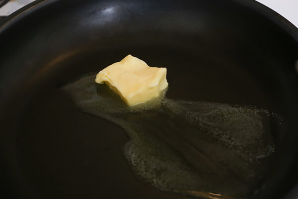 Butter melting in a pan.