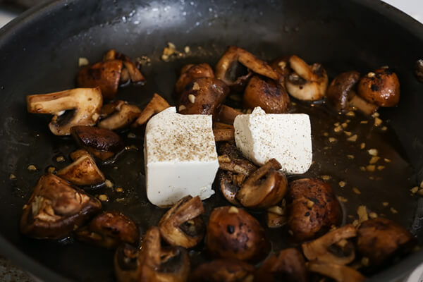 Adding cream cheese to keto stroganoff.