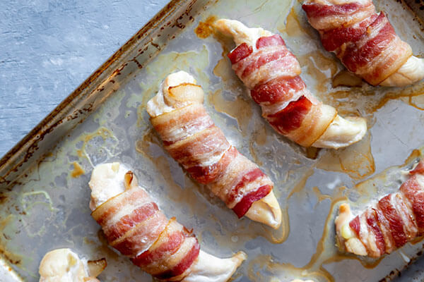 Baking the wrapped chicken.