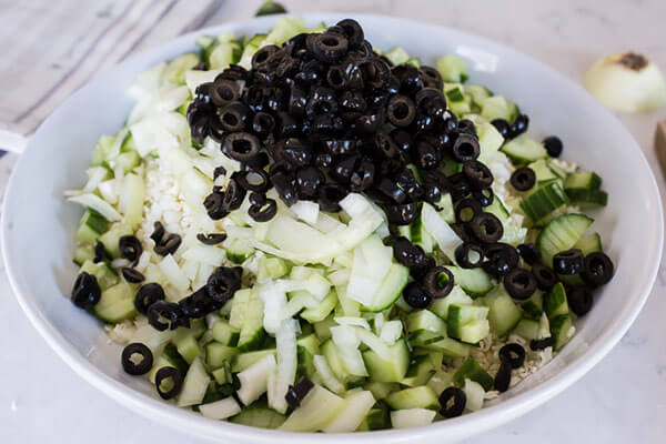 Unmixed chopped ingredients in a bowl.