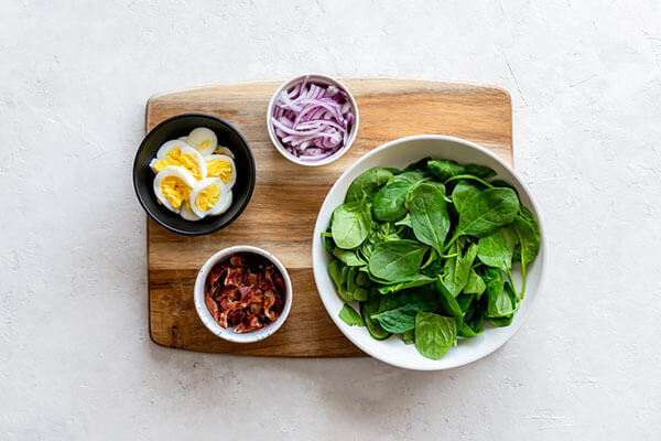 Spinach and salad ingredients.